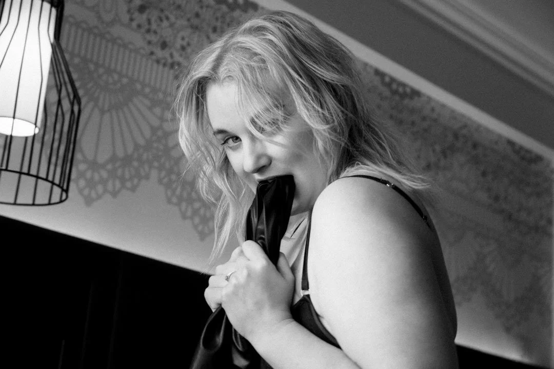 woman bite leather desire