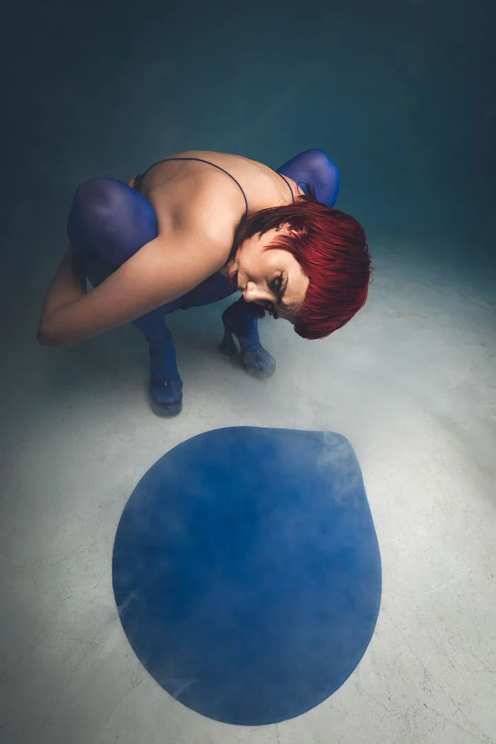 woman exploring blue carpet
