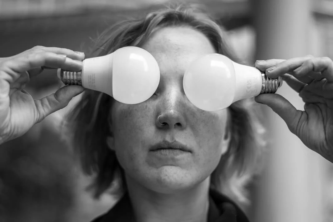 woman light bulb eyes