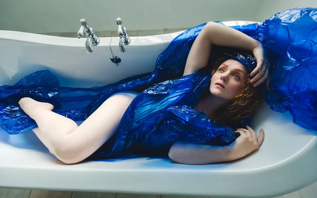 woman blue cellophane bath