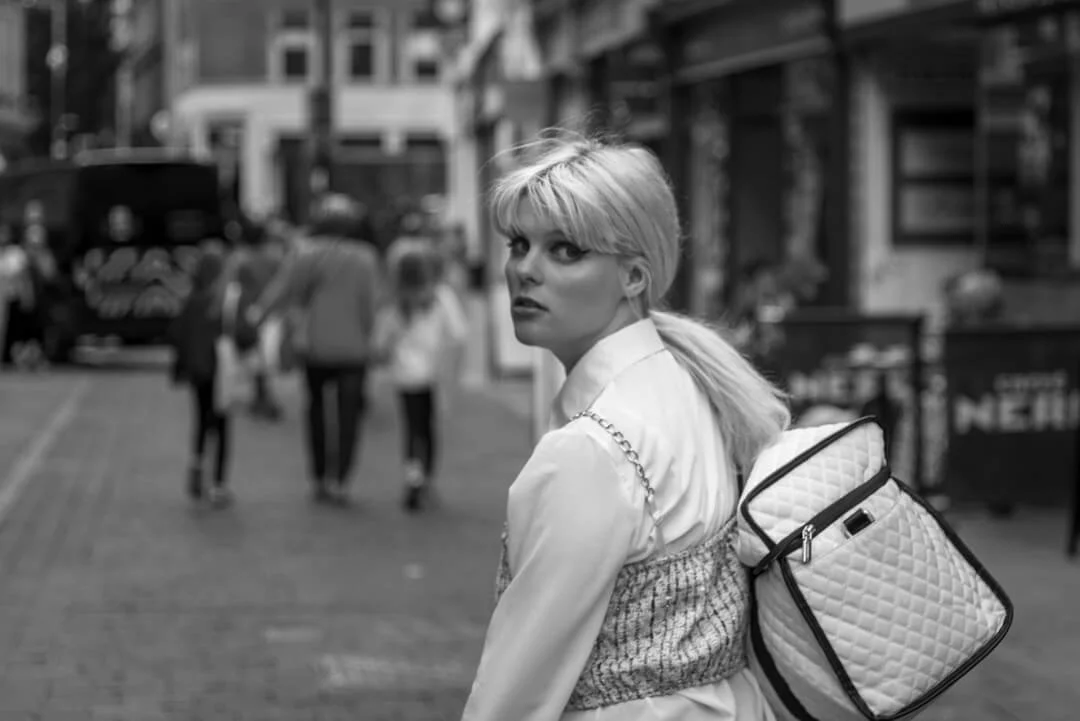 woman looking over shoulder