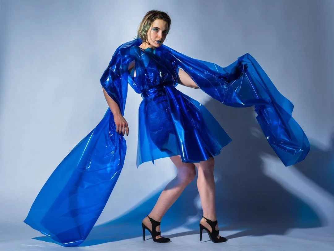 woman blue cellophane dress