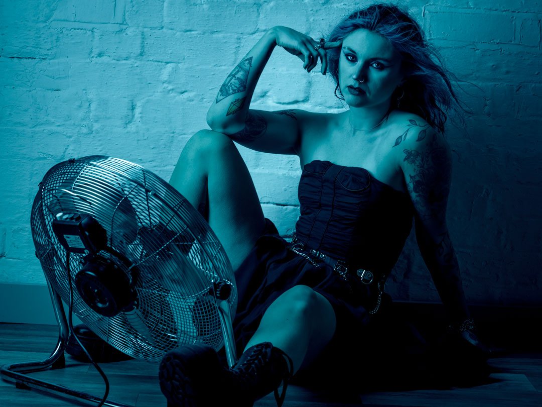 woman blue fan pose