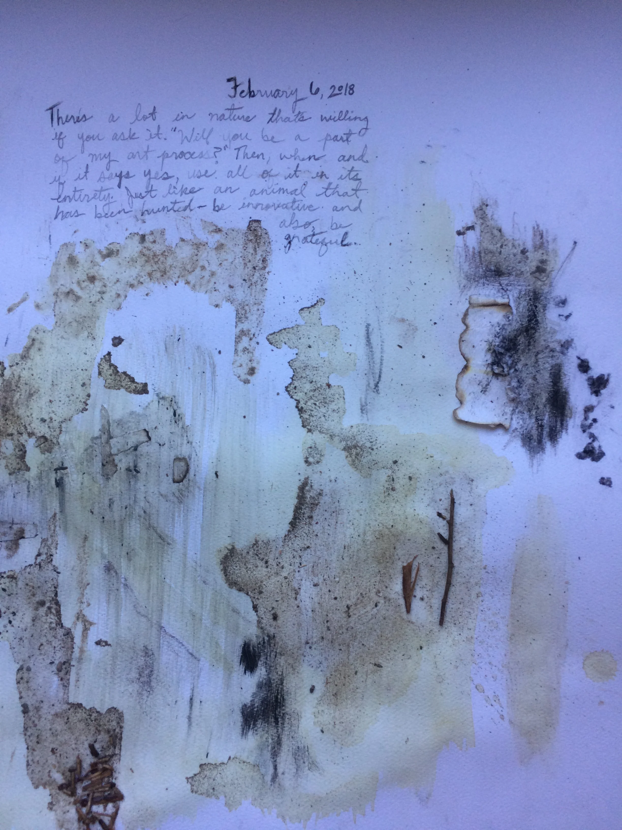 A piece of paper with handwritten notes dated February 6, 2018, featuring a quote about nature and art, with large, irregular splotches of dirt or mold partially obscuring the writing.