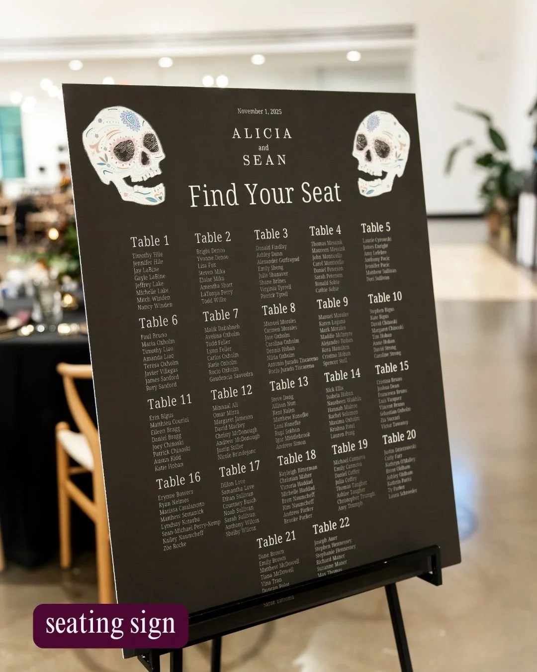 Seating chart for a wedding or event, titled 'Alicia and Sean Find Your Seat,' with table assignments and names of guests, decorated with skull illustrations at the top.