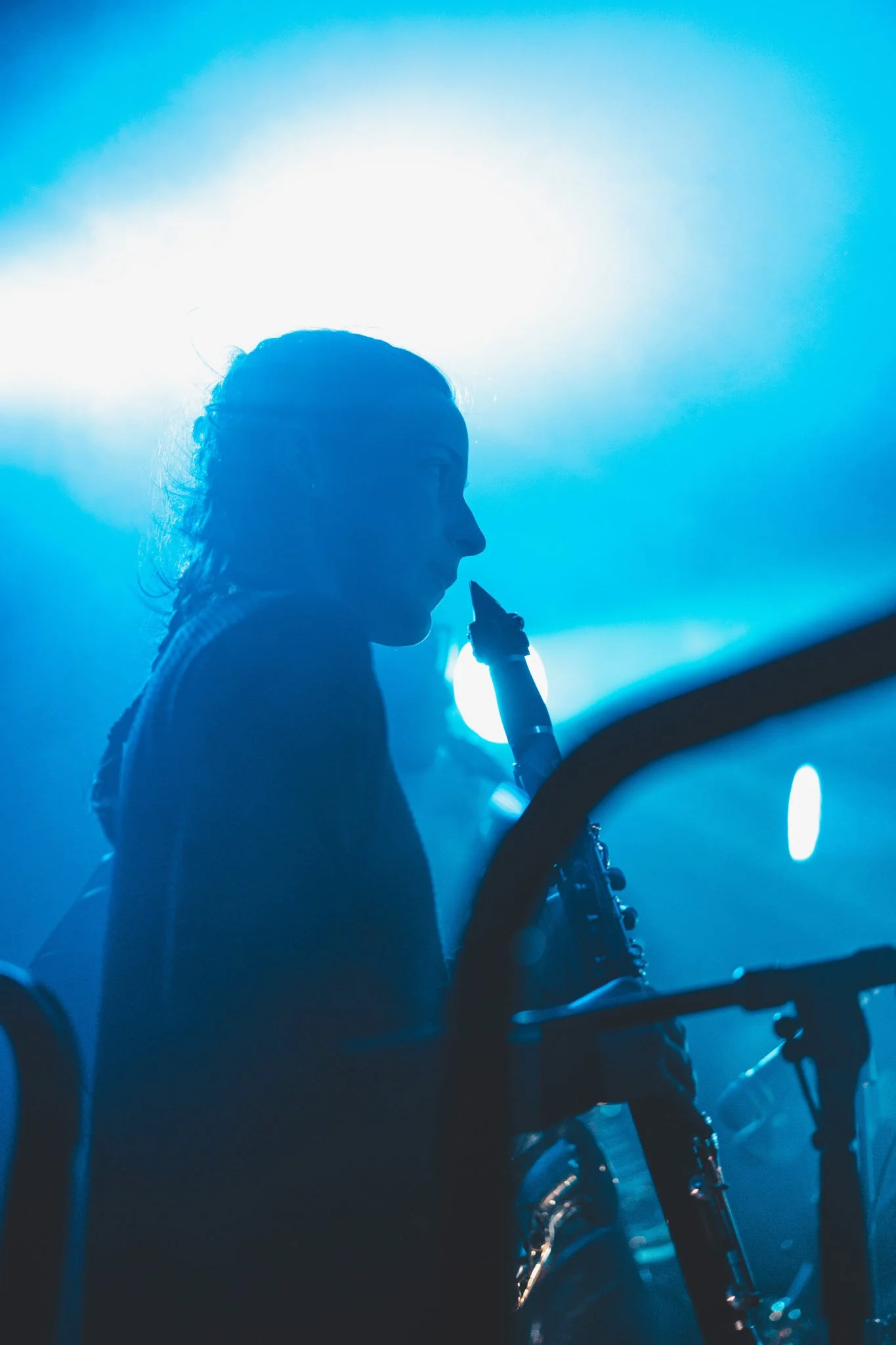 Band member performing live on stage for Symphonica and Mr Switch, at The Mill Birmingham