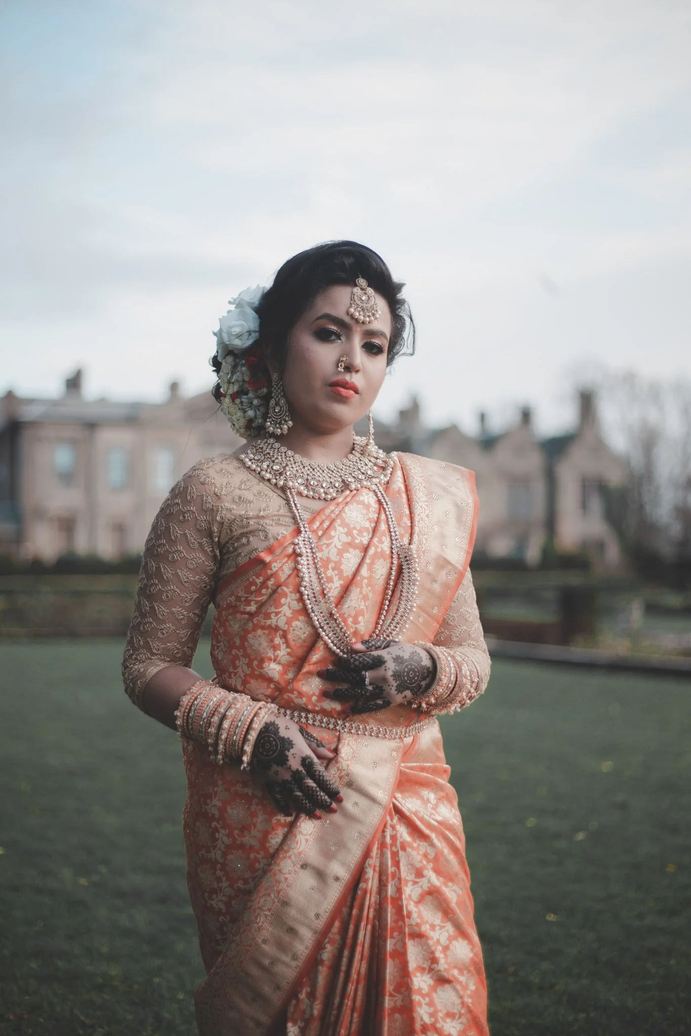 Indian bride in front of Coombe Abbey Hotel, Coventry