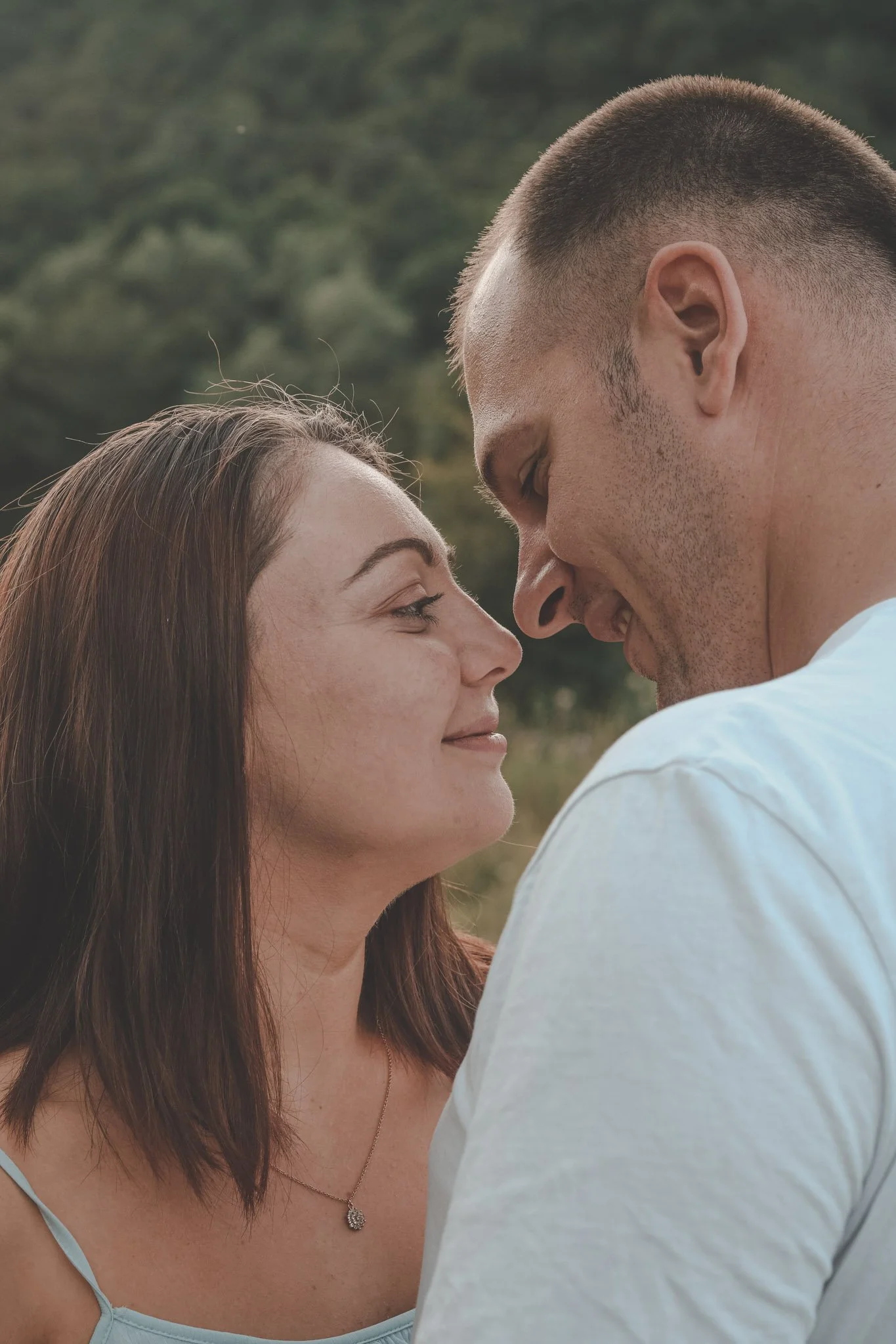 Couple almost giving each other a kiss