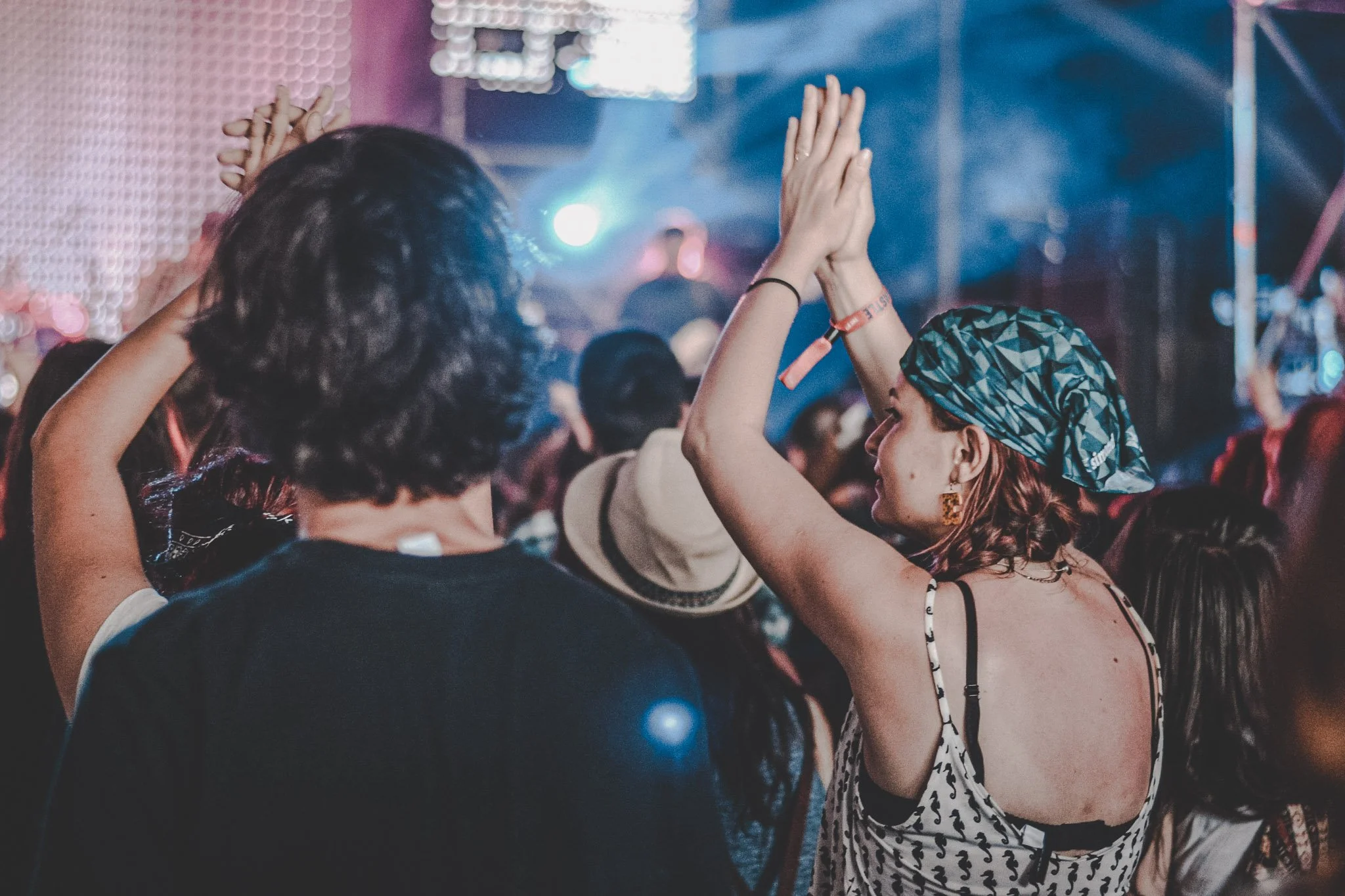 Girl clapping her hands in front of one of the stages of Electric Castle Festival
