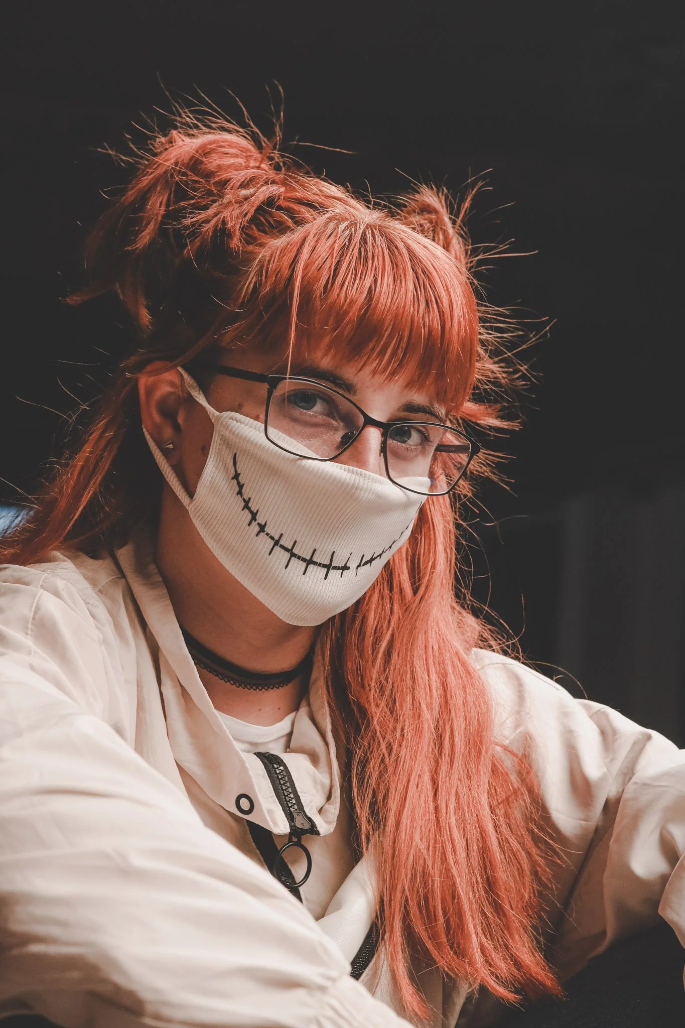 Portrait of a redhead wearing a mask 
