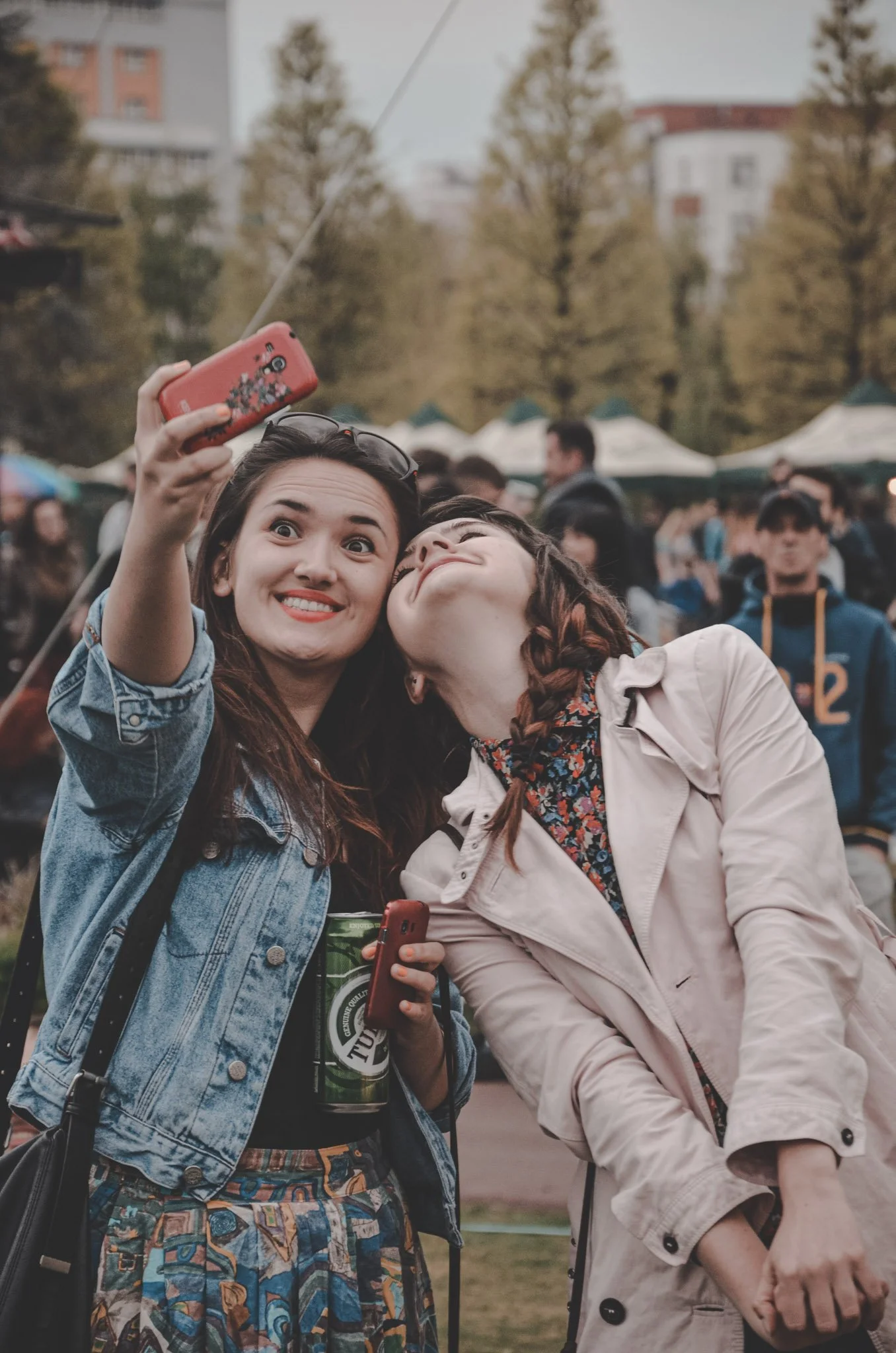 Two girls taking a selfie at an festival in Cluj-Napoca