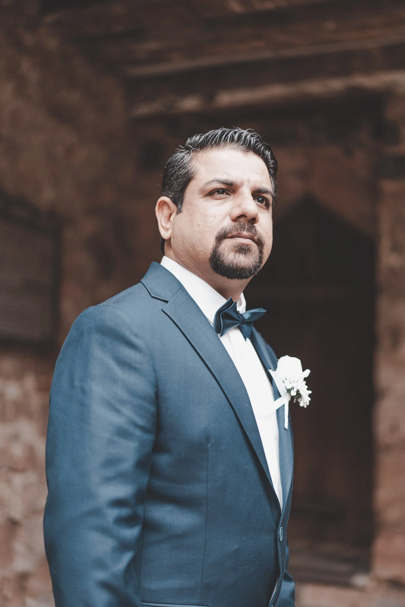 Portrait of a groom in front of Cheylesmore Manor House, Coventry