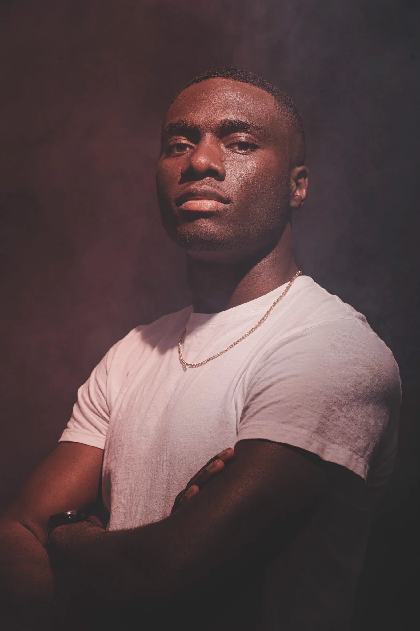 Portrait of a man wearing a white t-shirt in a studio photography session in Coventry