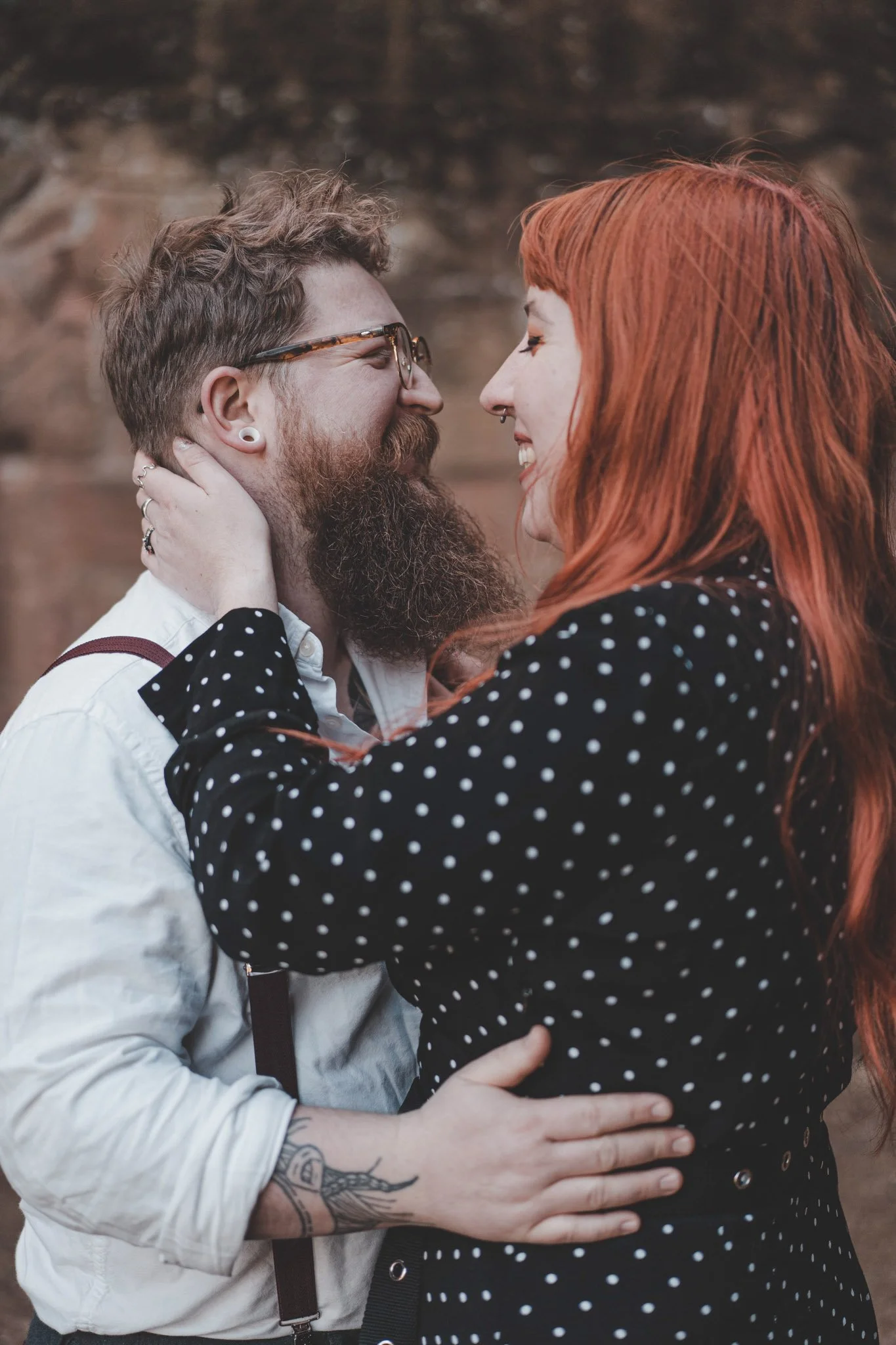 couple having a laugh at their couple outdoor photoshoot in Kenilworth, UK
