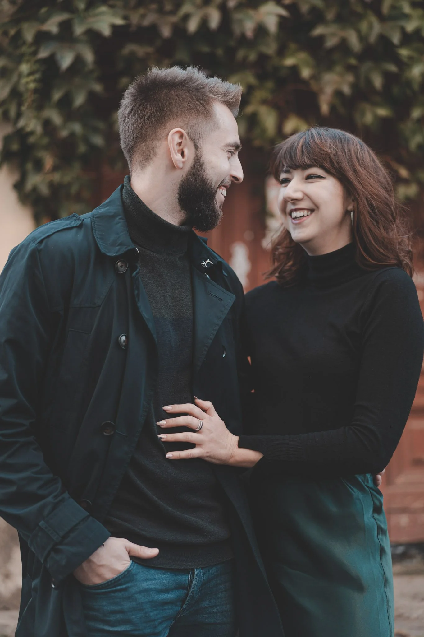 Young stylish couple having a good time during their couple photoshoot on Cluj-Napoca's streets