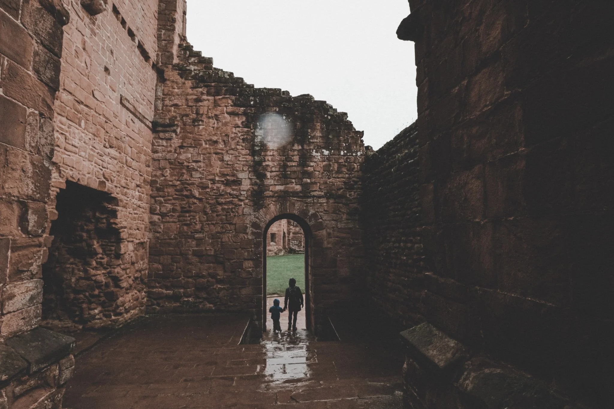 Mom and son photographed walking throught the ruins of Kenilworth Castle, West Midlands 