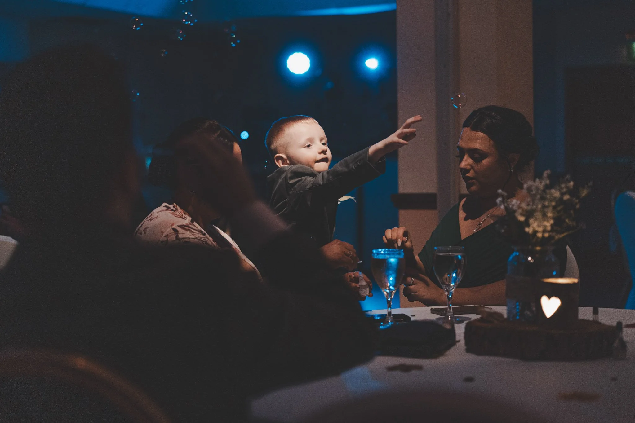 Little boy photographed at a wedding party