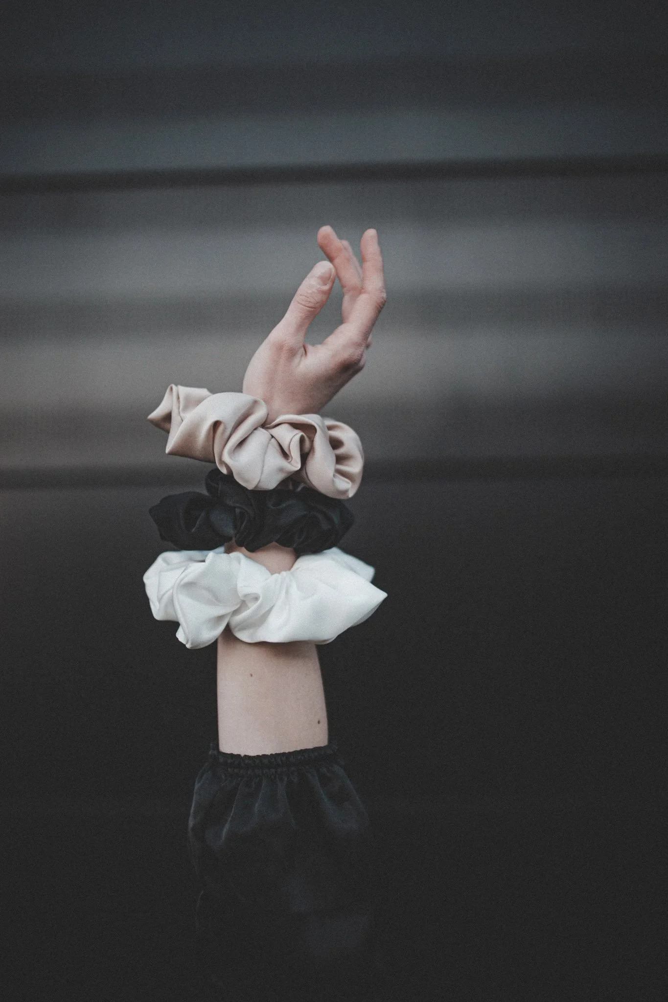 Detail photo of three hairbands on a hand, during a product photography session in Coventry, West Midlands