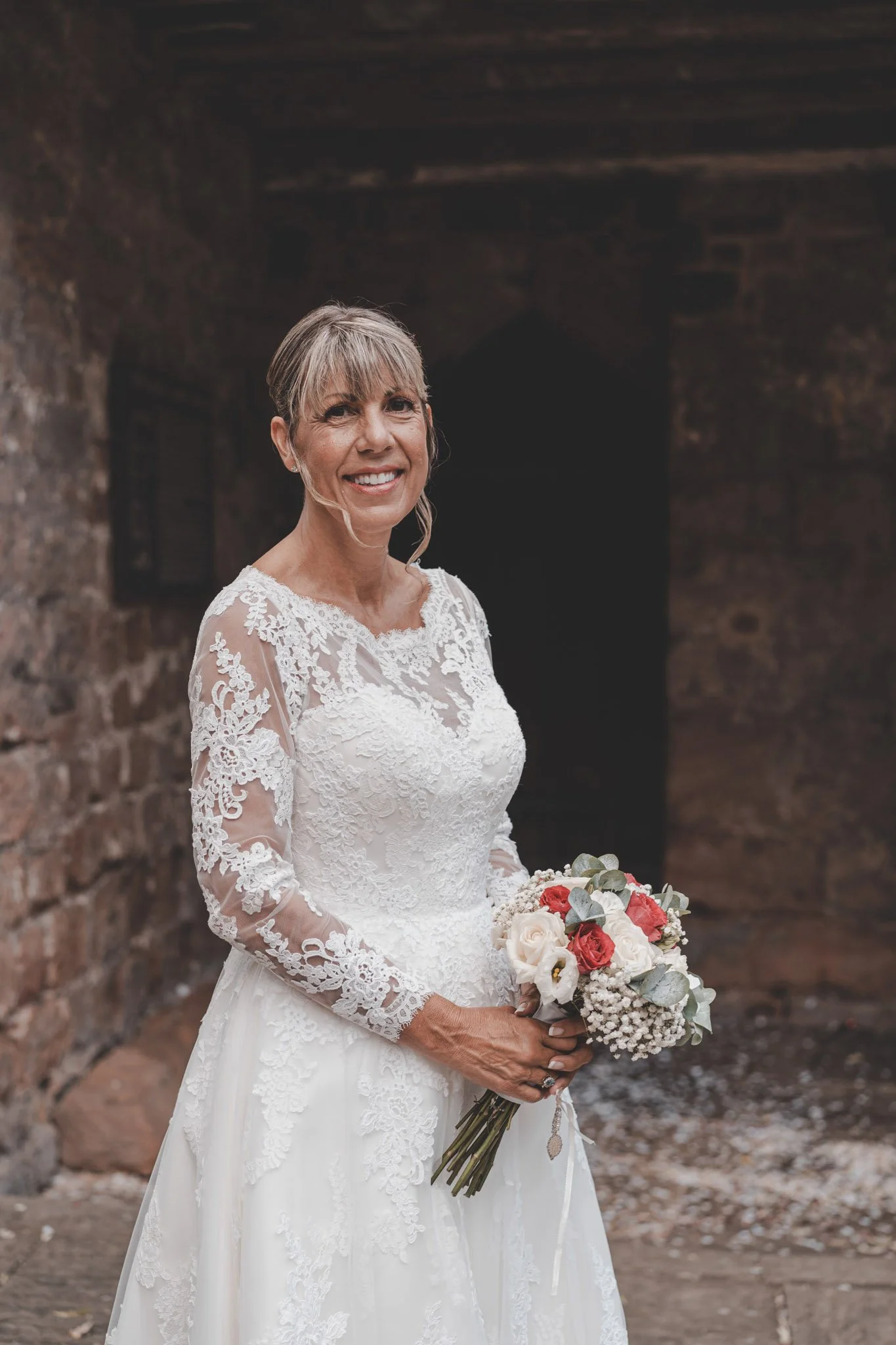 Portrait of a bride in front of Cheylesmore Manor House, Coventry