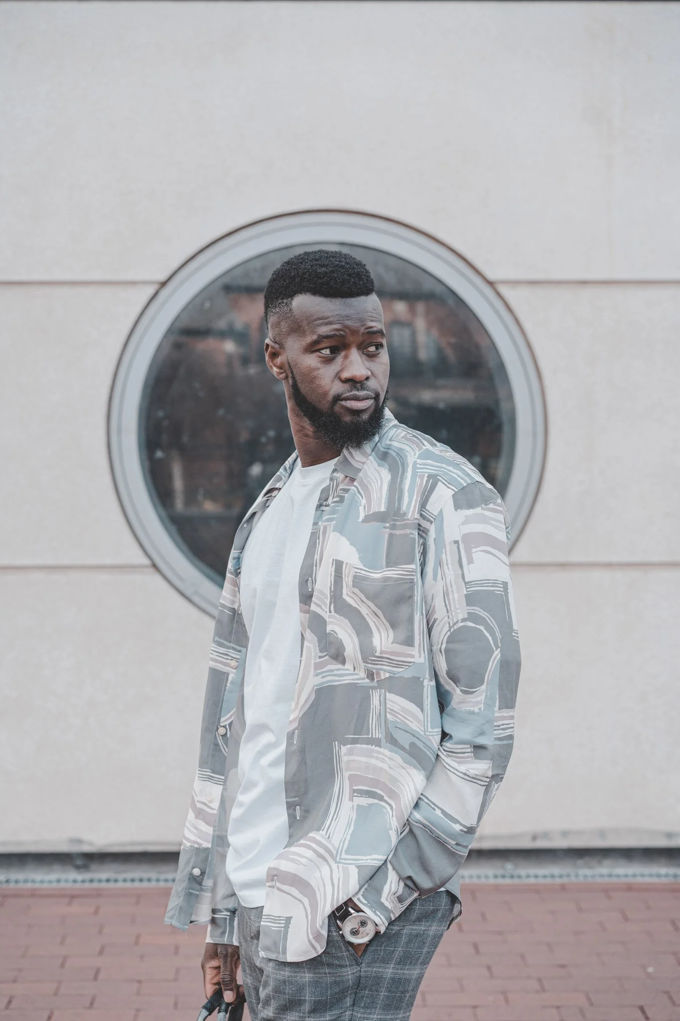 Man posing in front of Sea Life, Birmingham