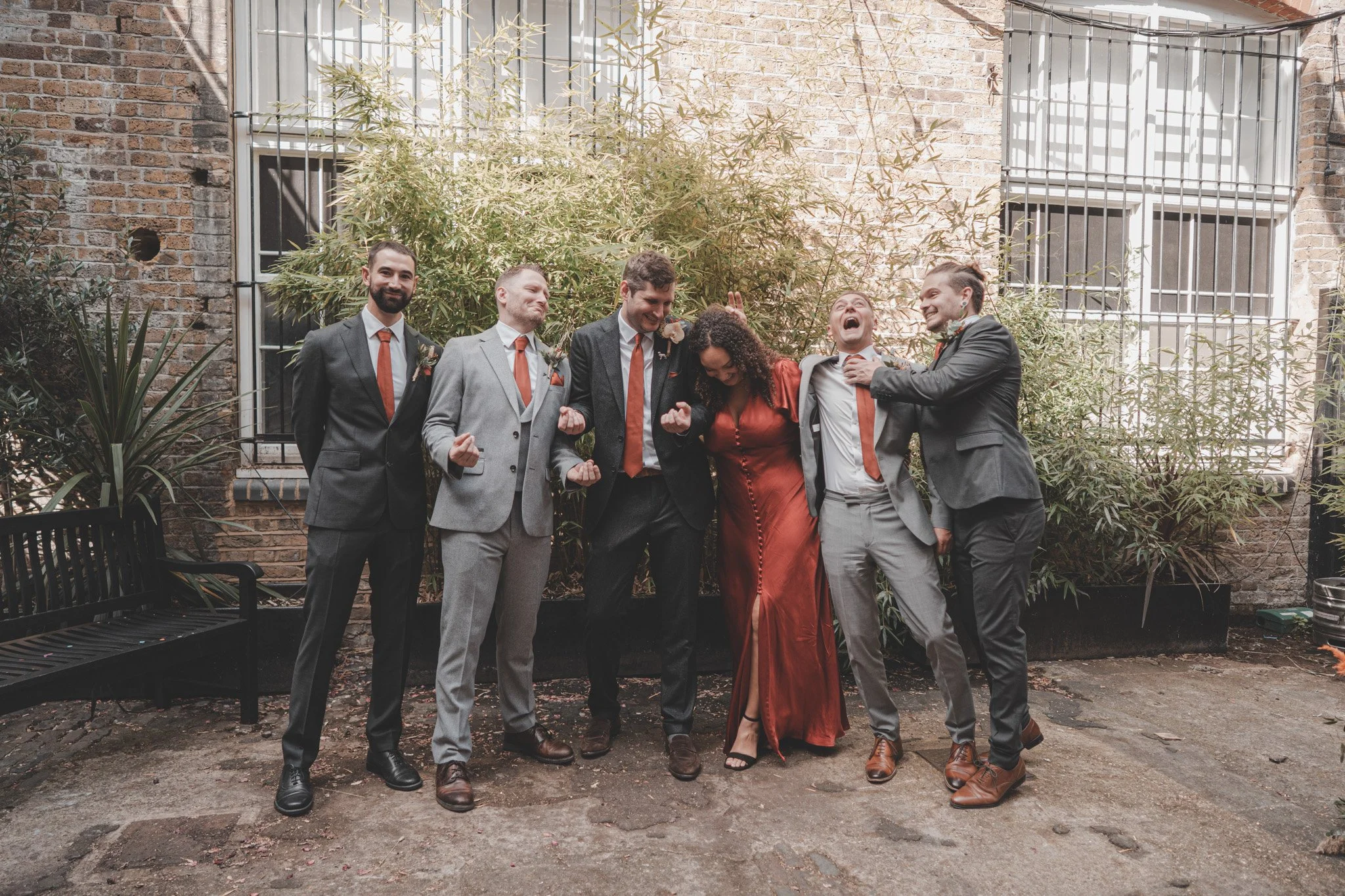 Funny group photo of a groom and his friends on his wedding day, at The Depot, London