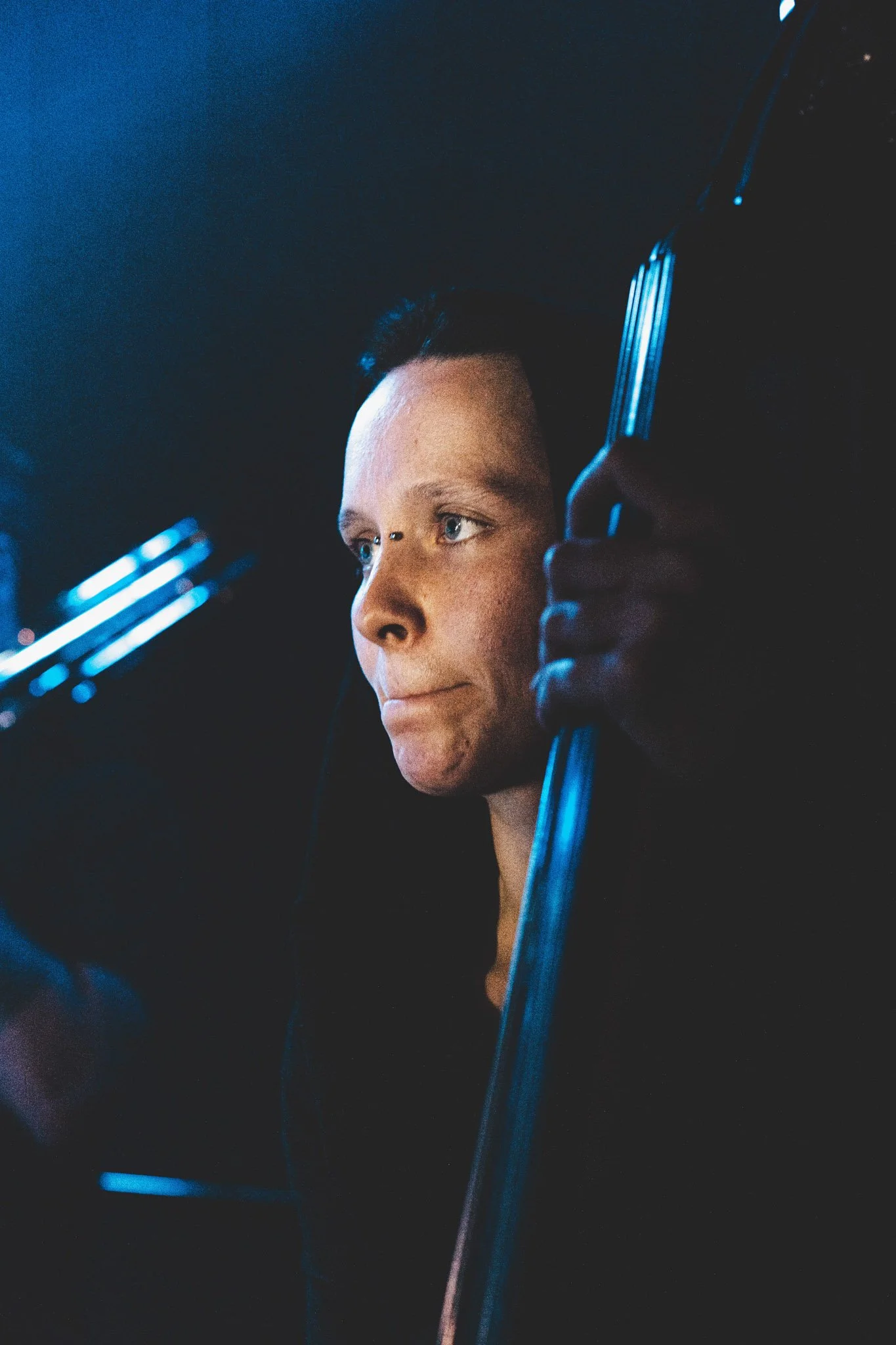 Portrait of a band member on stage at the Mill, Birmingham UK