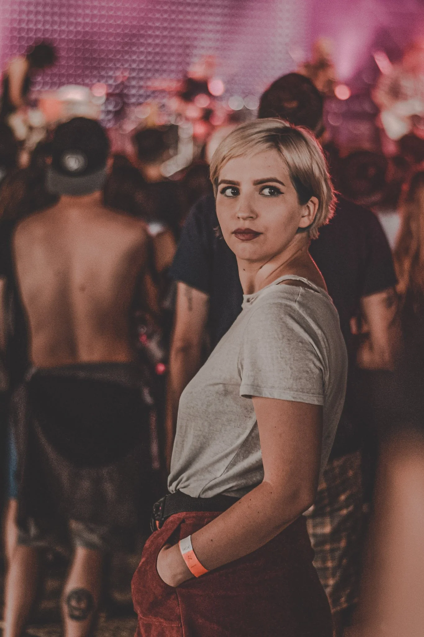 Portrait of a girl in front of a stage at Electric Castle Festival