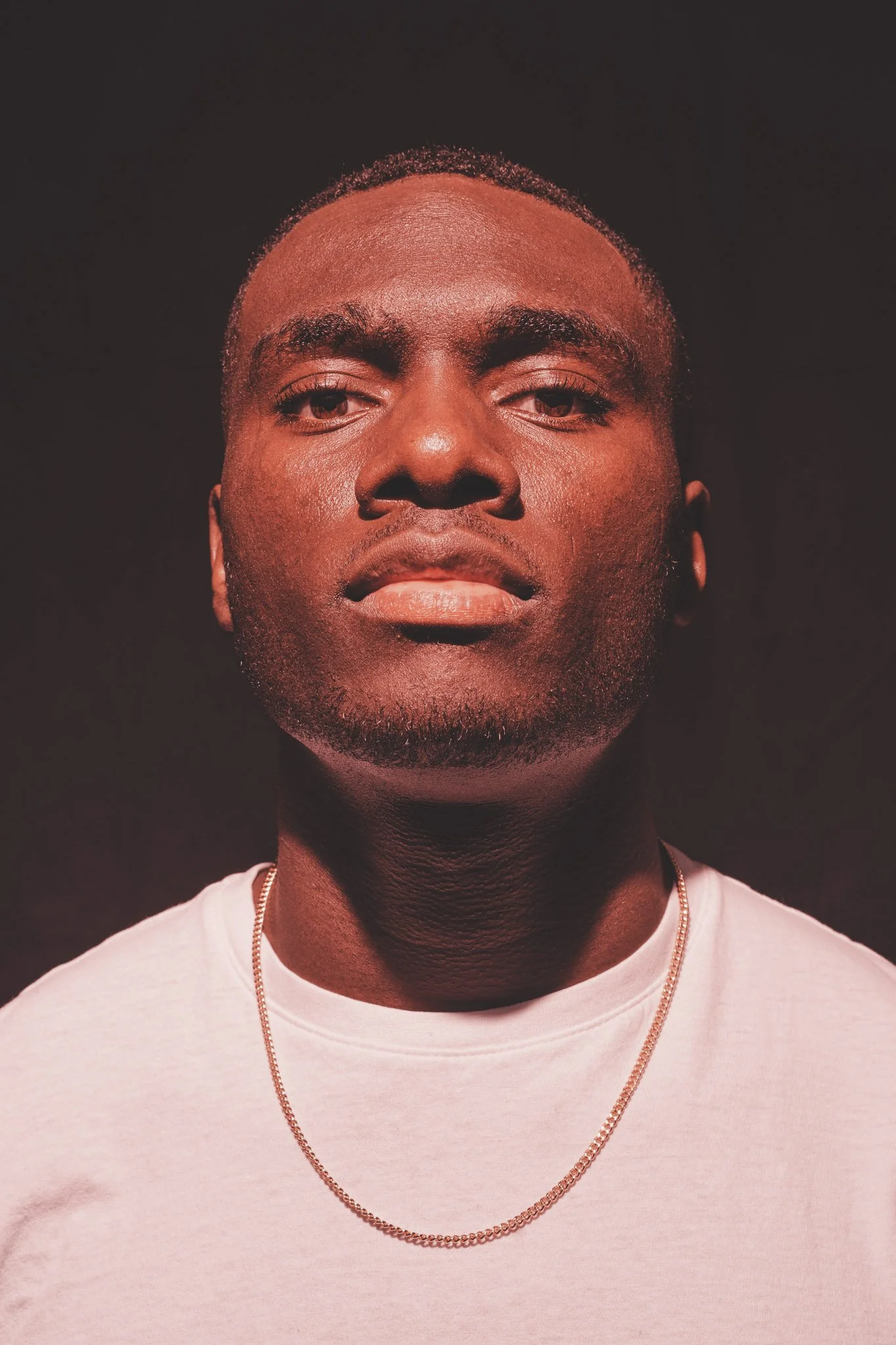 Portrait of West Midlands musician Ozy, in a studio photo session in Coventry