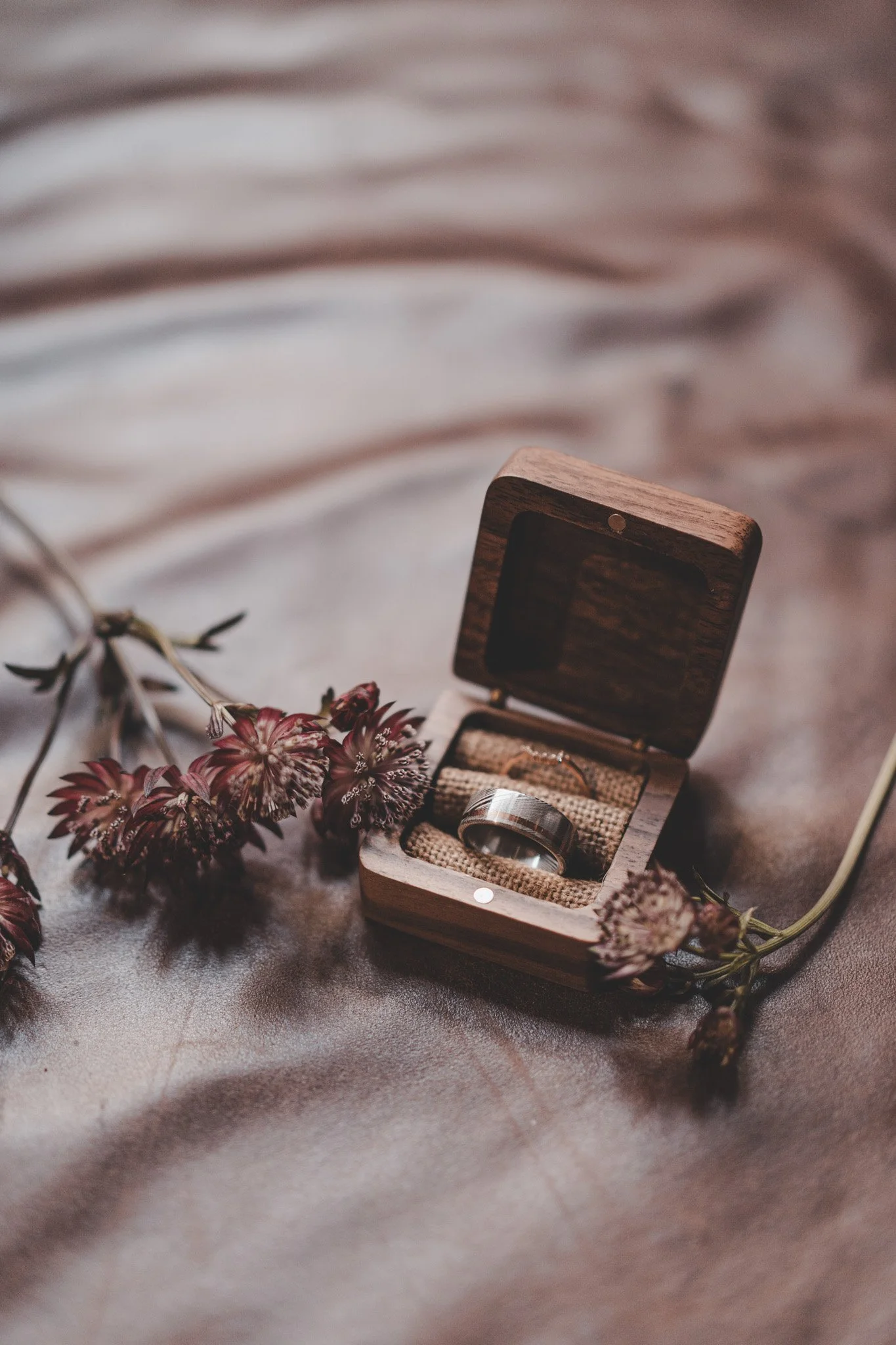 Detail of wedding ring box and flowers 