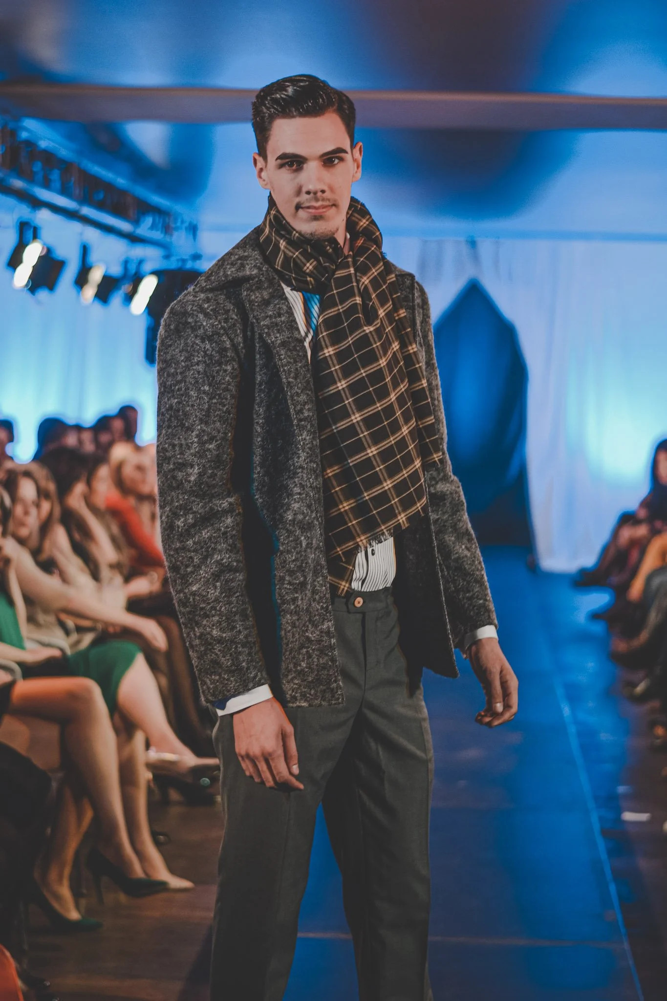 Male model on the catwalk at a fashion show in Cluj-Napoca