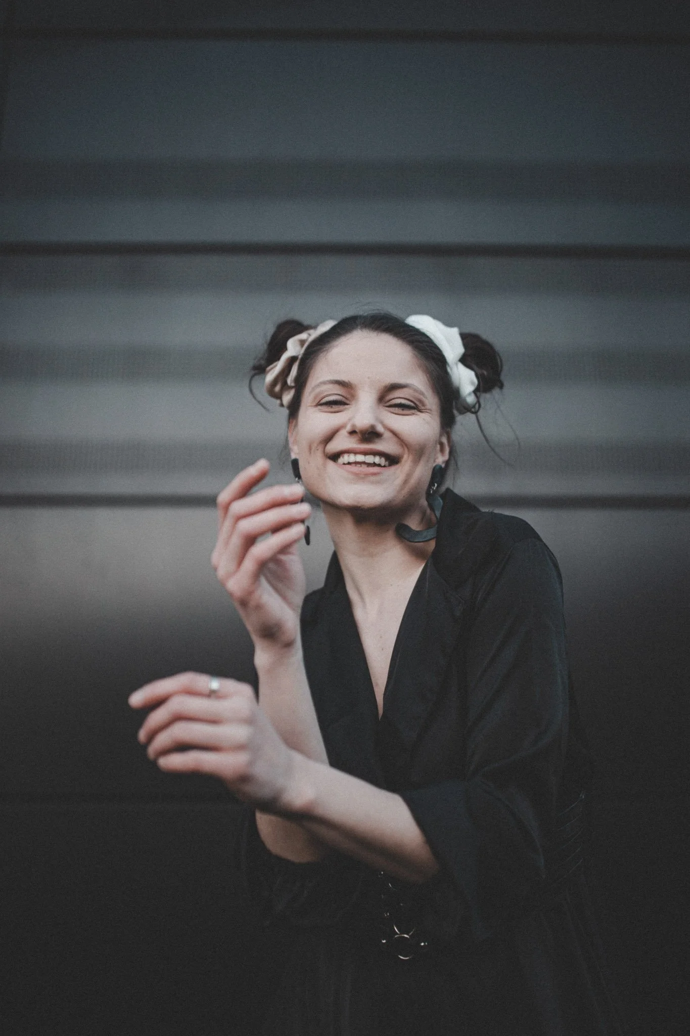 Girl wearing a Lunaticusse dress smiling at the camera
