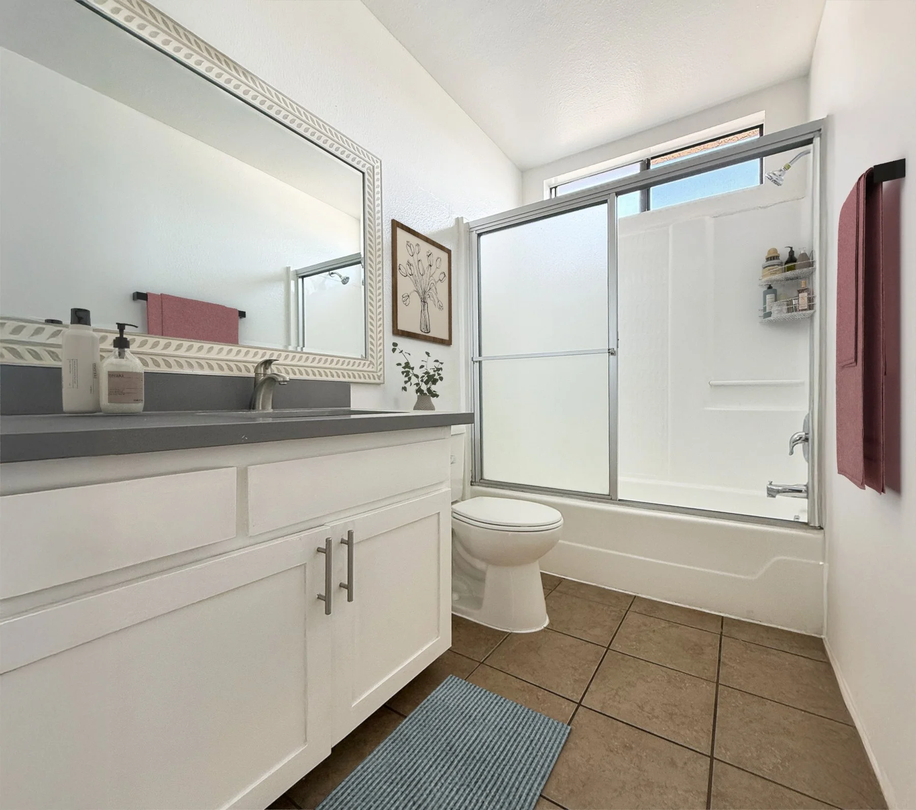 A photo of the bathroom in a one-bedroom unit at Valley Glen. This bathroom features a shower/bath combo. 