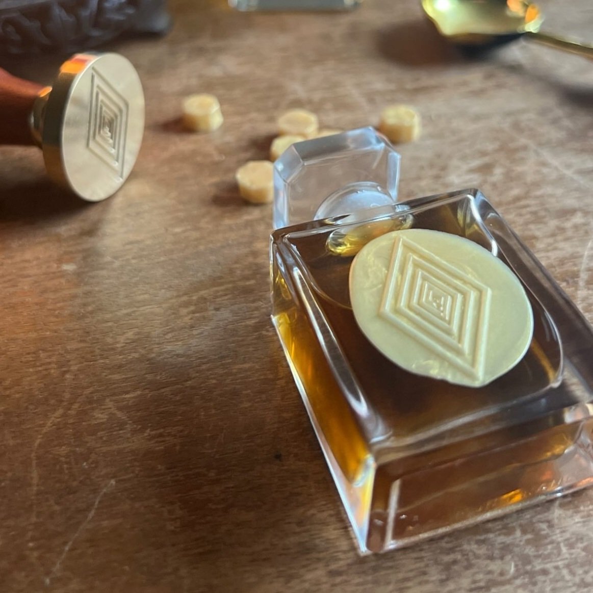 Photo of Resonance Perfumery bottle of perfume with diamond logo