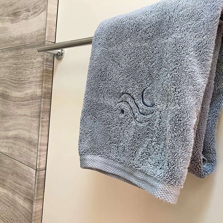 Yosemite Moonstone Retreat logo embroidered on a bath towel