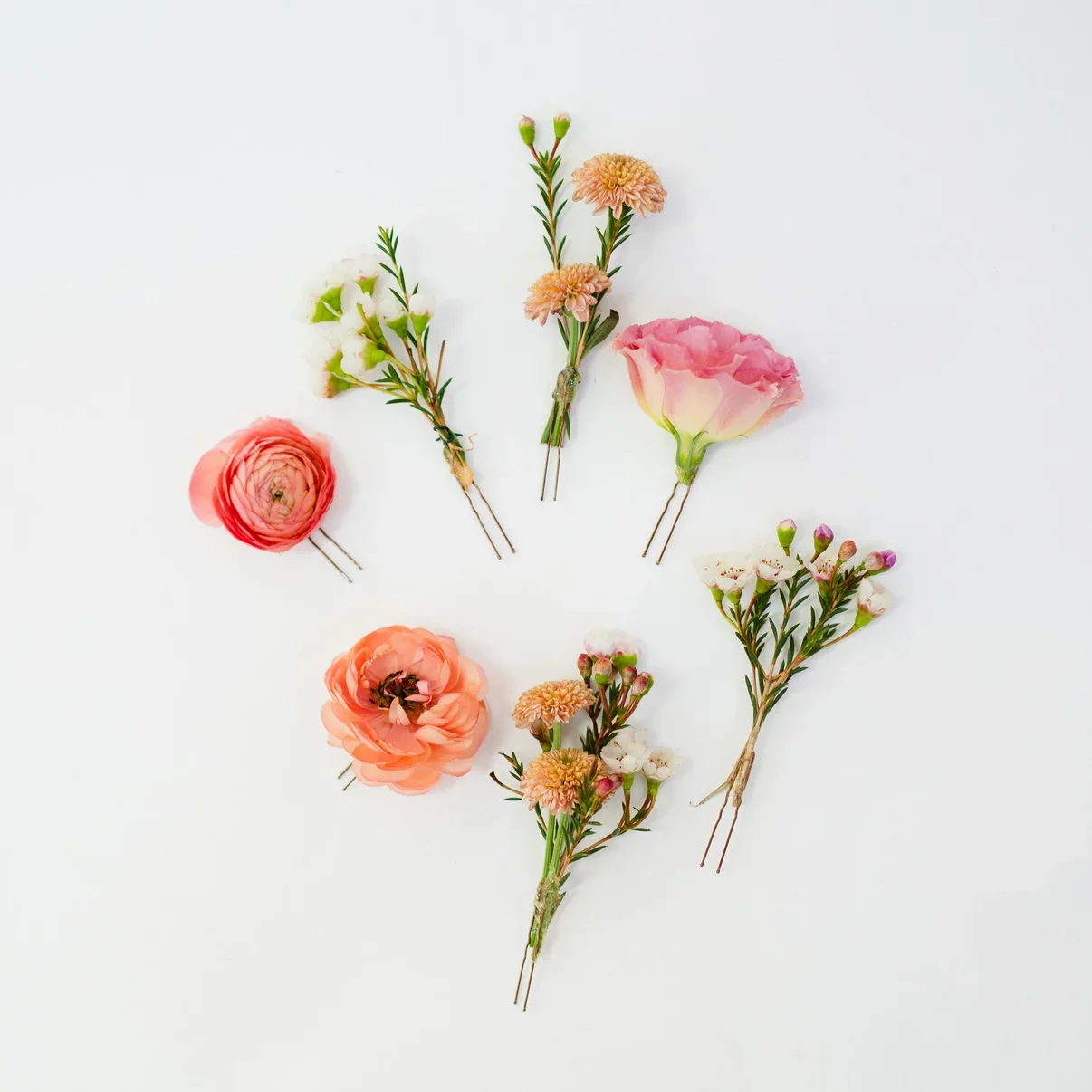   FLOWER HAIR PINS: $65  