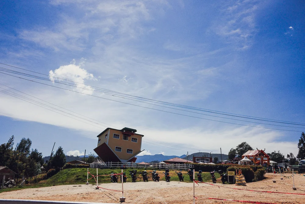 Tilted house on hillside
