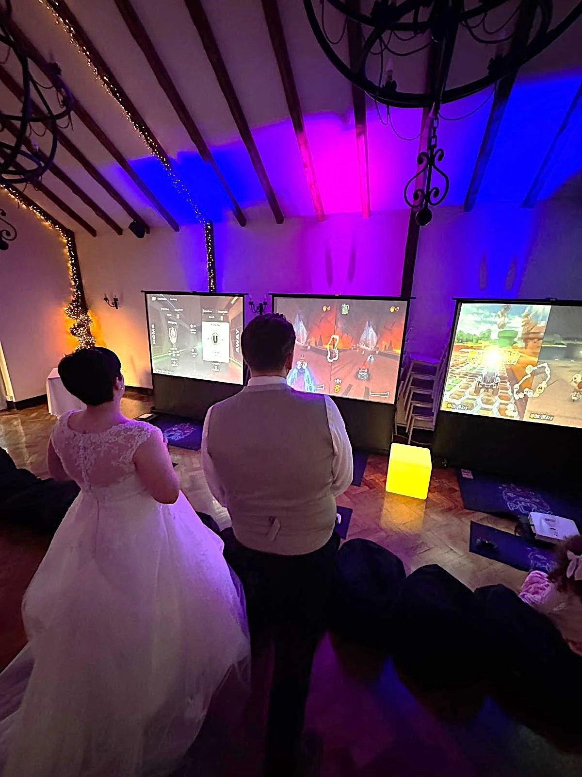 Bride and groom enjoying Door2Door Gaming at their wedding