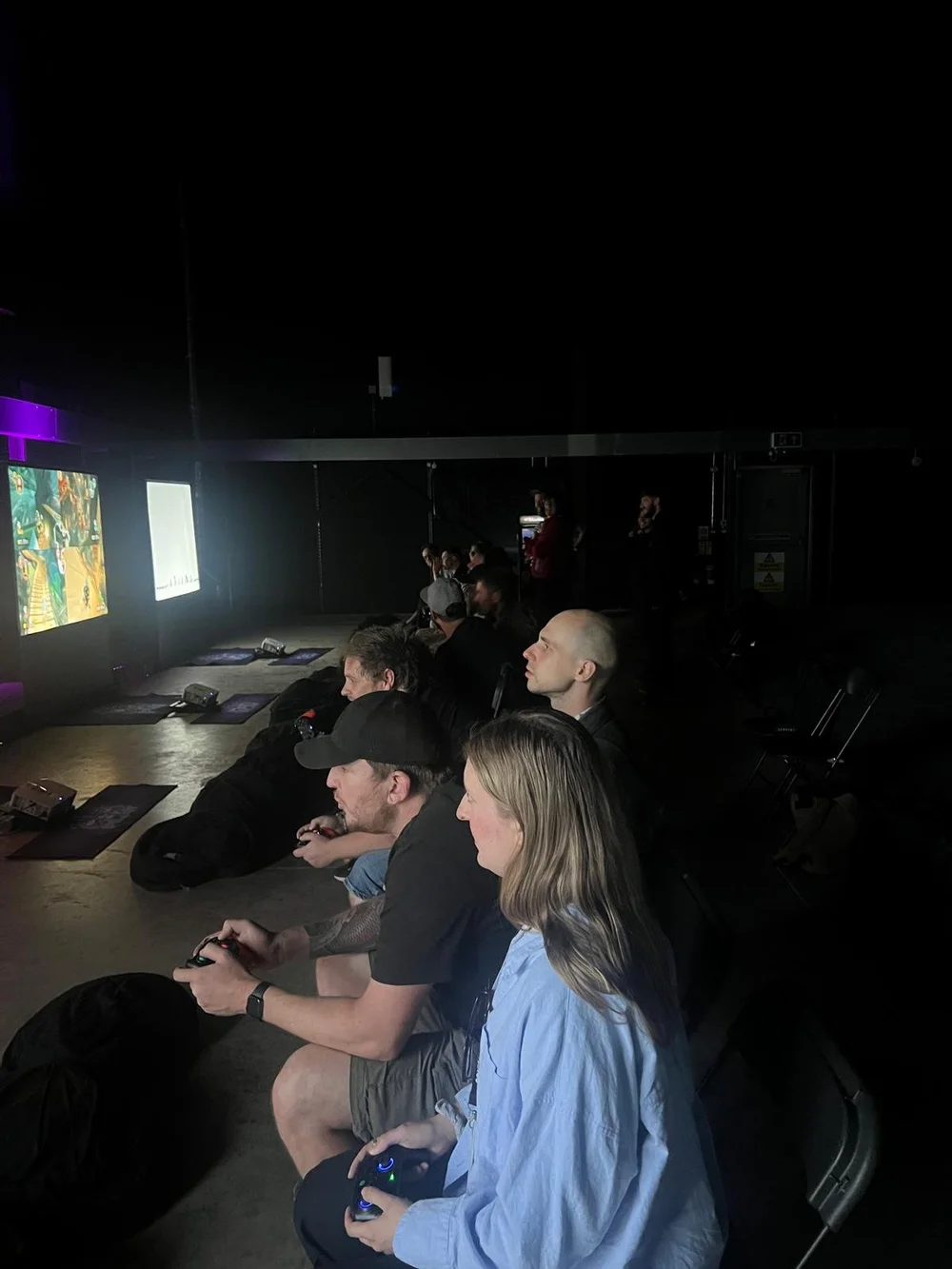 Pupils using gaming stations at an event
