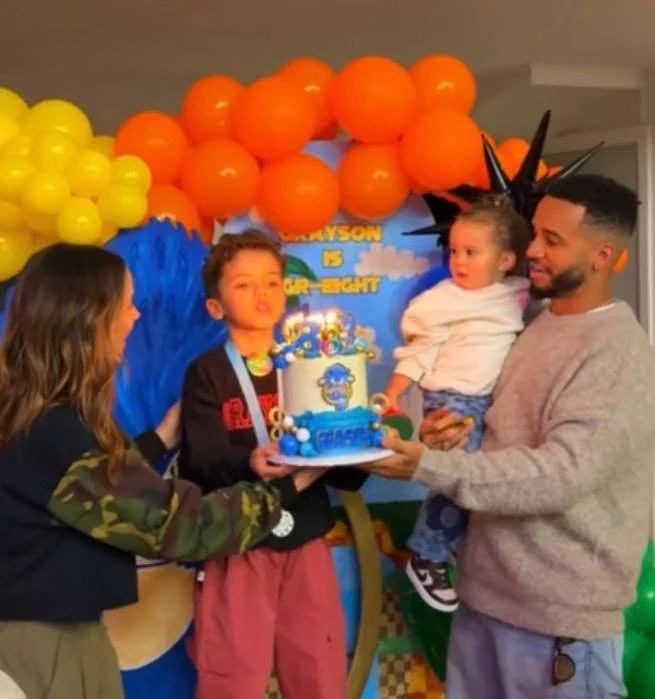 Aston Merrygold and family at a Door2Door Gaming party