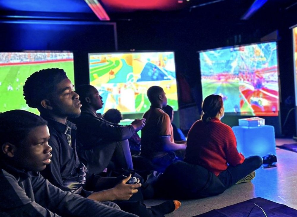 Children enjoying a hosted gaming experience