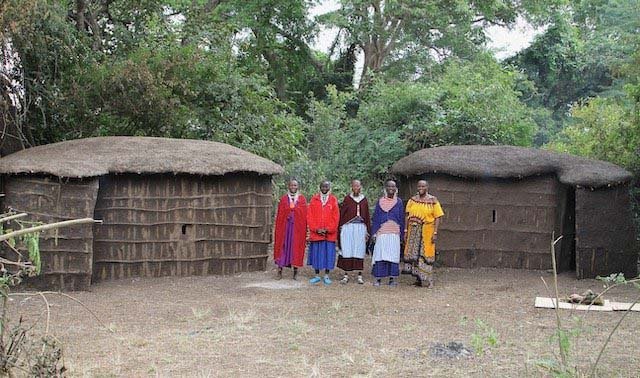 Tanzania- people and hut.jpg