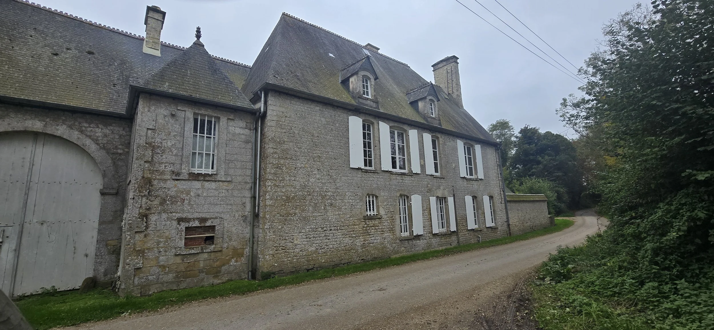 Braecort Manor -The headgrows in front had Guns which Easy company neutralised on D Day.