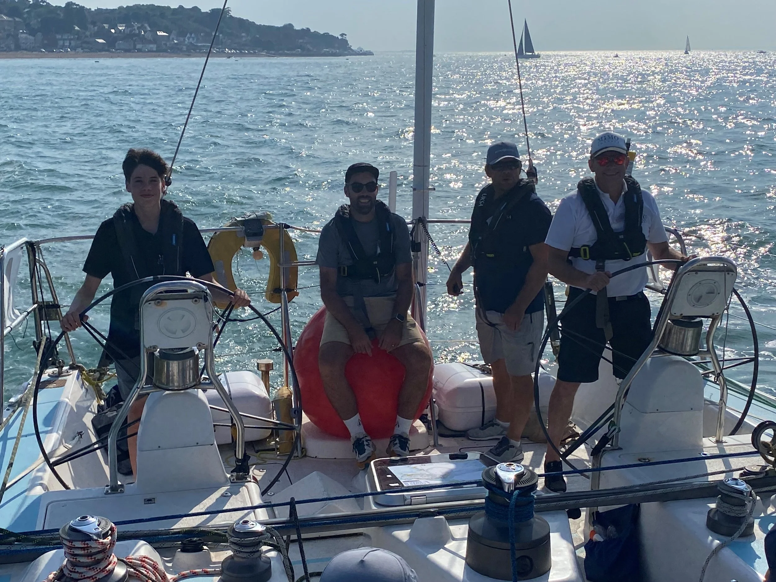 Andy and son sailing.jpg