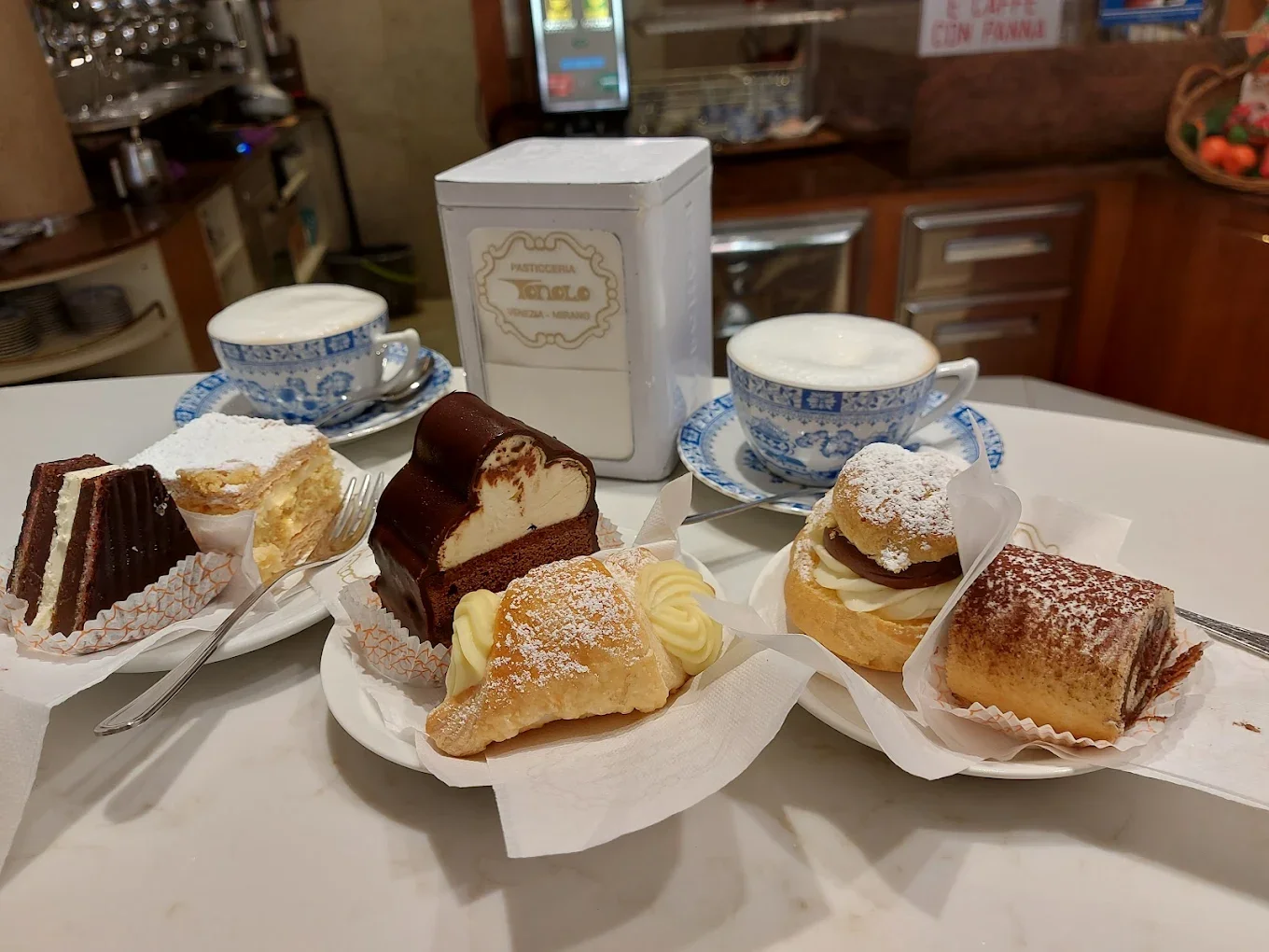 venice Pastries and coffee cups at Pasticceria Tonolo, San Polo Venice.webp