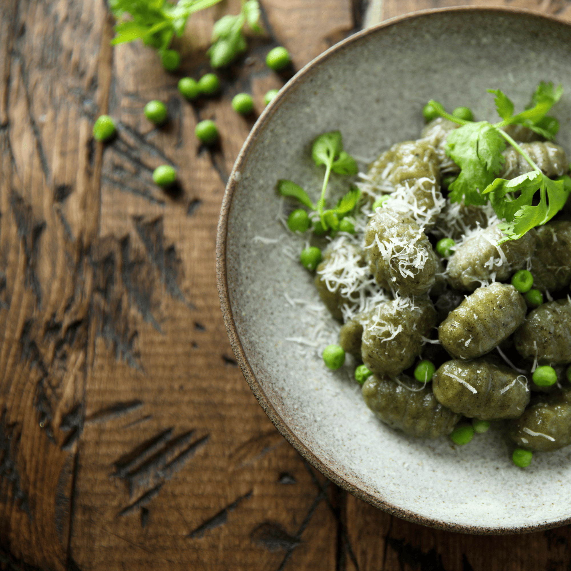 Gnocchis aux épinards et petits pois, crème légère au parmesan