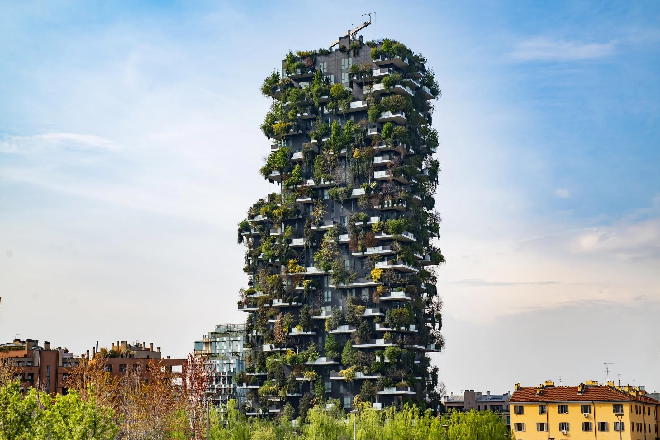 Bosco Verticale residential towers integrating forest ecosystems into dense urban architecture.