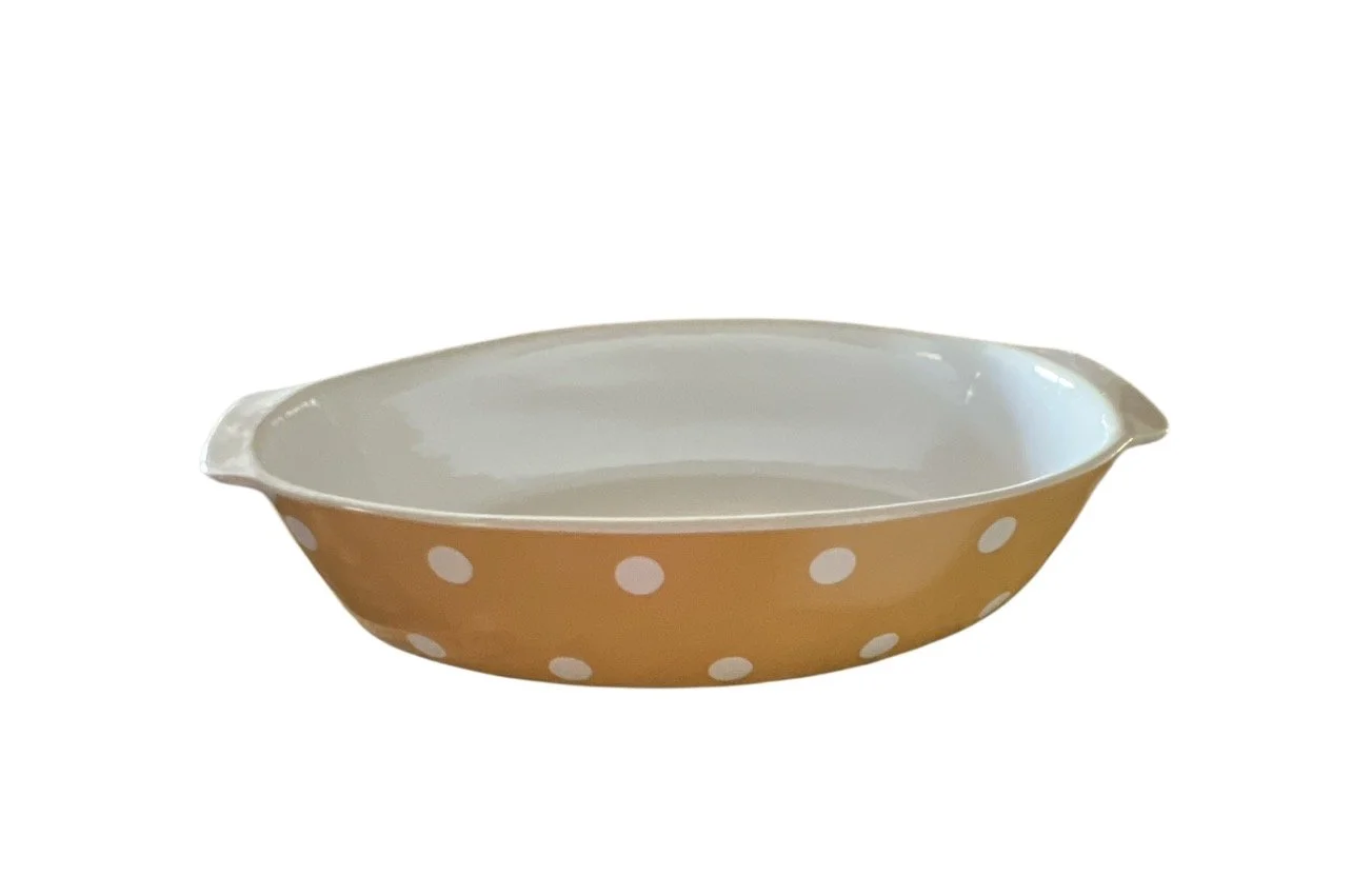 polka dotted yellow ceramic oven bowl