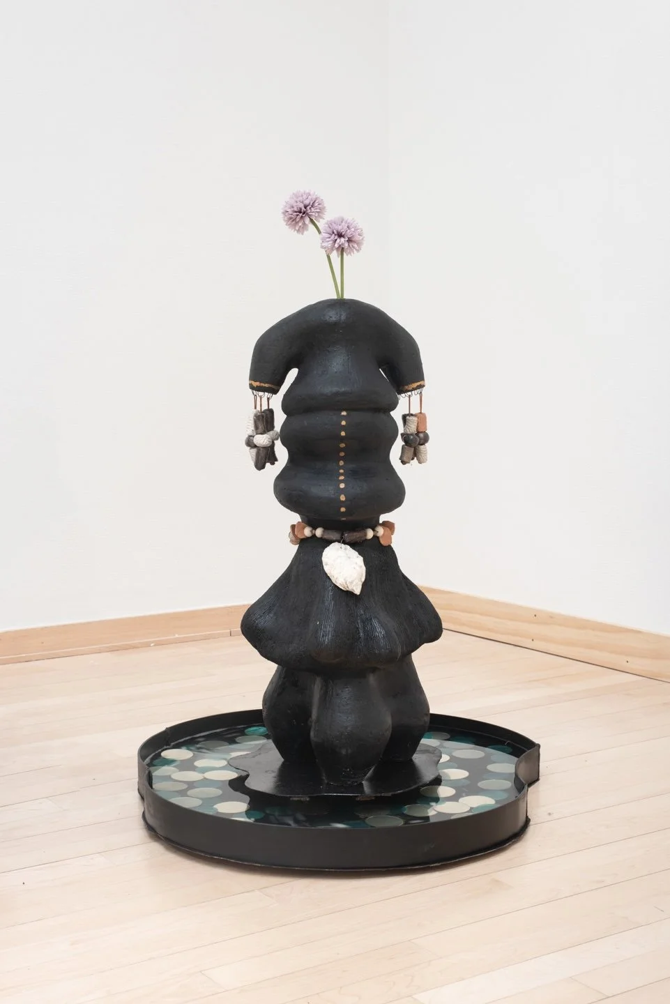 The head that wears the crown | Ceramic, beads, oyster shells, flowers, metal base with water pump | 27x11x11.5 In | 2023