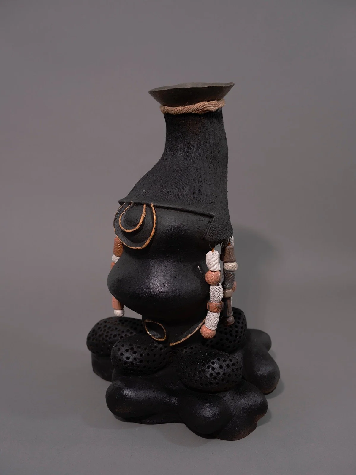 Tribesmen I Ceramics, beads, blacksmith bowl, jute, luster | 22x18x13.3 | 2023