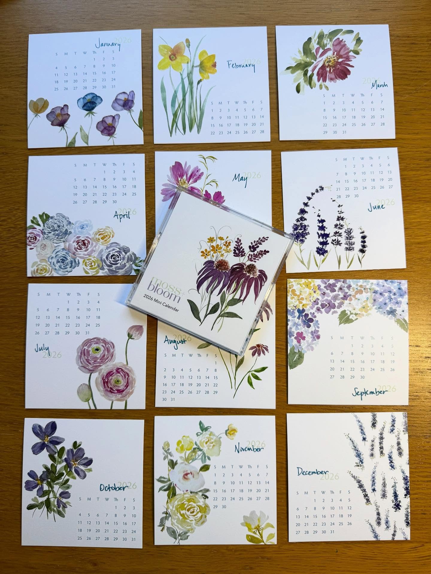 Start 2026 surrounded by art. This Mini Desk Calendar features 14 of my watercolor florals &mdash; one for each month, plus a little extra joy. Printed on thick high quality card-stock and perfectly petite at just over 3.5&rdquo; wide for your desk, 